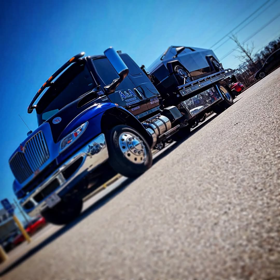 Photo Gallery 20 A&A Towing Services hauling an EV car.