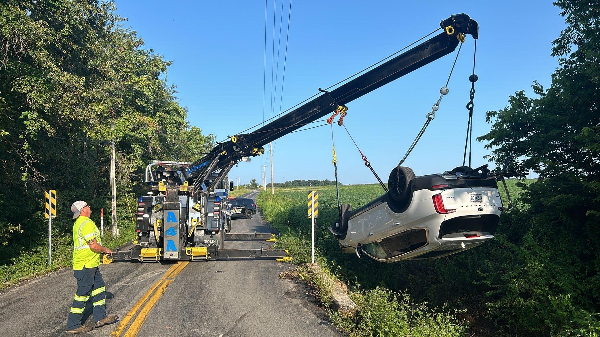 Photo Gallery 18 Bolin Services rotator pulling a vehicle out of a ditch.
