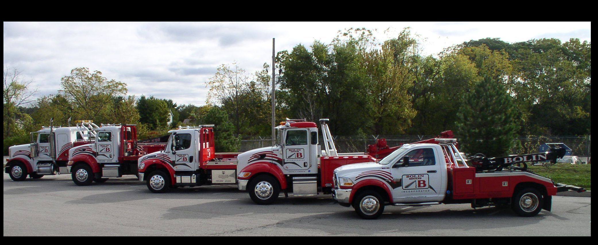 Photo Gallery 14 Bolin Services trucks all lines up.